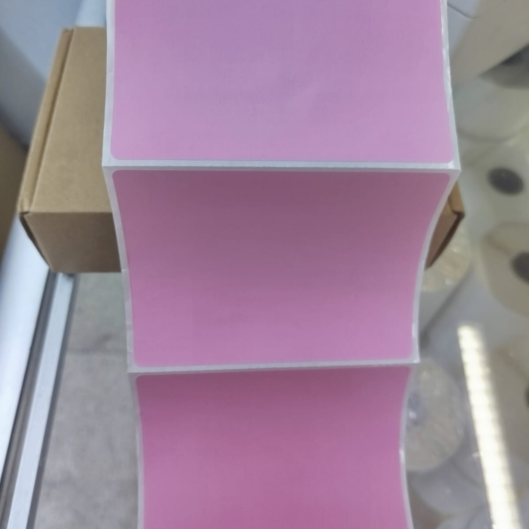 ROLLO DE ETIQUETA TT 4" X 3"(10CM X 7.5CM) 1COLUMNAS ,500 ETIQ FONDO ROSADO BAJO PRODUCCION